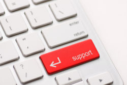 27543903 – a computers support key on white keyboard